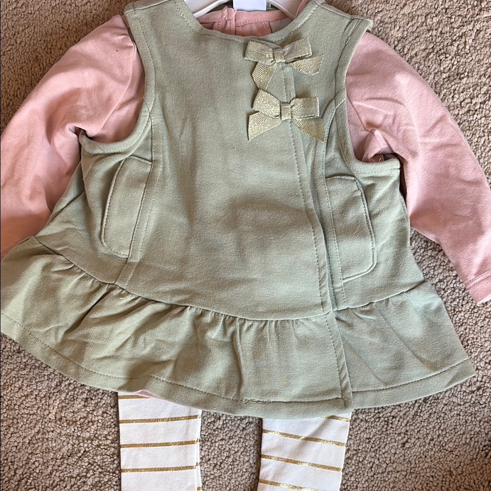 Green Dress with Pink Sleeves and Gold Striped Leggings